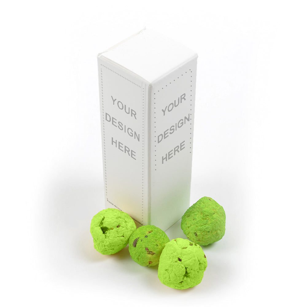four hand-crafted seed bombs made from recycled paper in green.