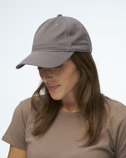 Customizable Econscious Organic Cotton 5-Panel Unstructured Baseball Hat on model.