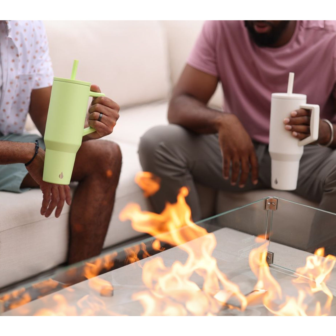 Customized Elemental 40 oz stainless steel tumbler with interchangeable straws being used around fire pit.