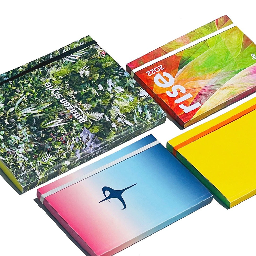 Customizable perfect bound wellness journals in multiple colors.