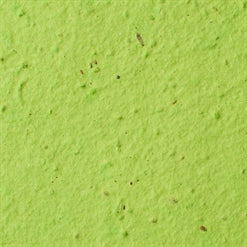 four hand-crafted seed bombs made from recycled paper in green.