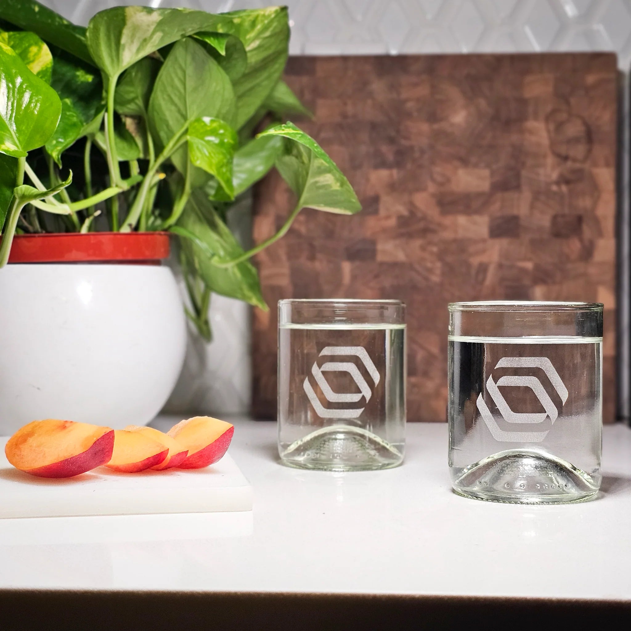 Refresh 12 0z wine bottle glasses in  clear and branded.