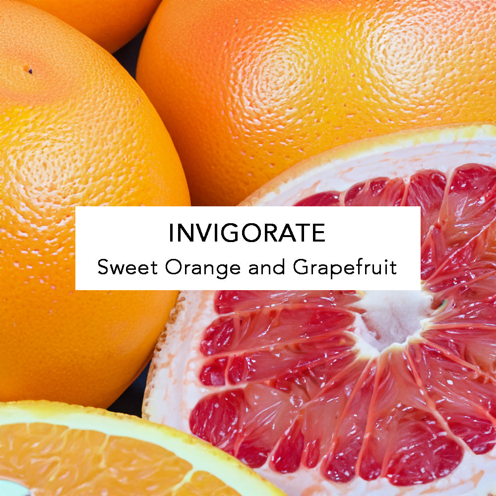 Essential Oil In Glass Dropper Bottle.  Invigorate: sweet orange and grapefruit.